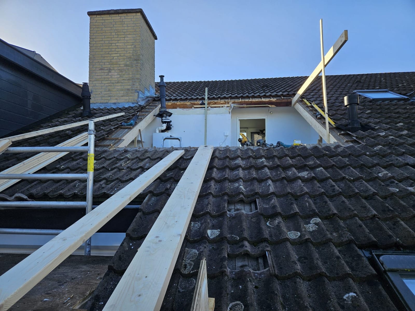 dakbedekking dakkapel vervangen prijs